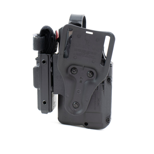 Pistol holster mount for tourniquet carrier.  Tourniquet Mounting bracket for Safariland SLS / ALS holsters.  Red dot and non-red dot sight models.   Red dot and non-red dot sight models. Eleven 10 RIGID TQ Case Holster Mount.